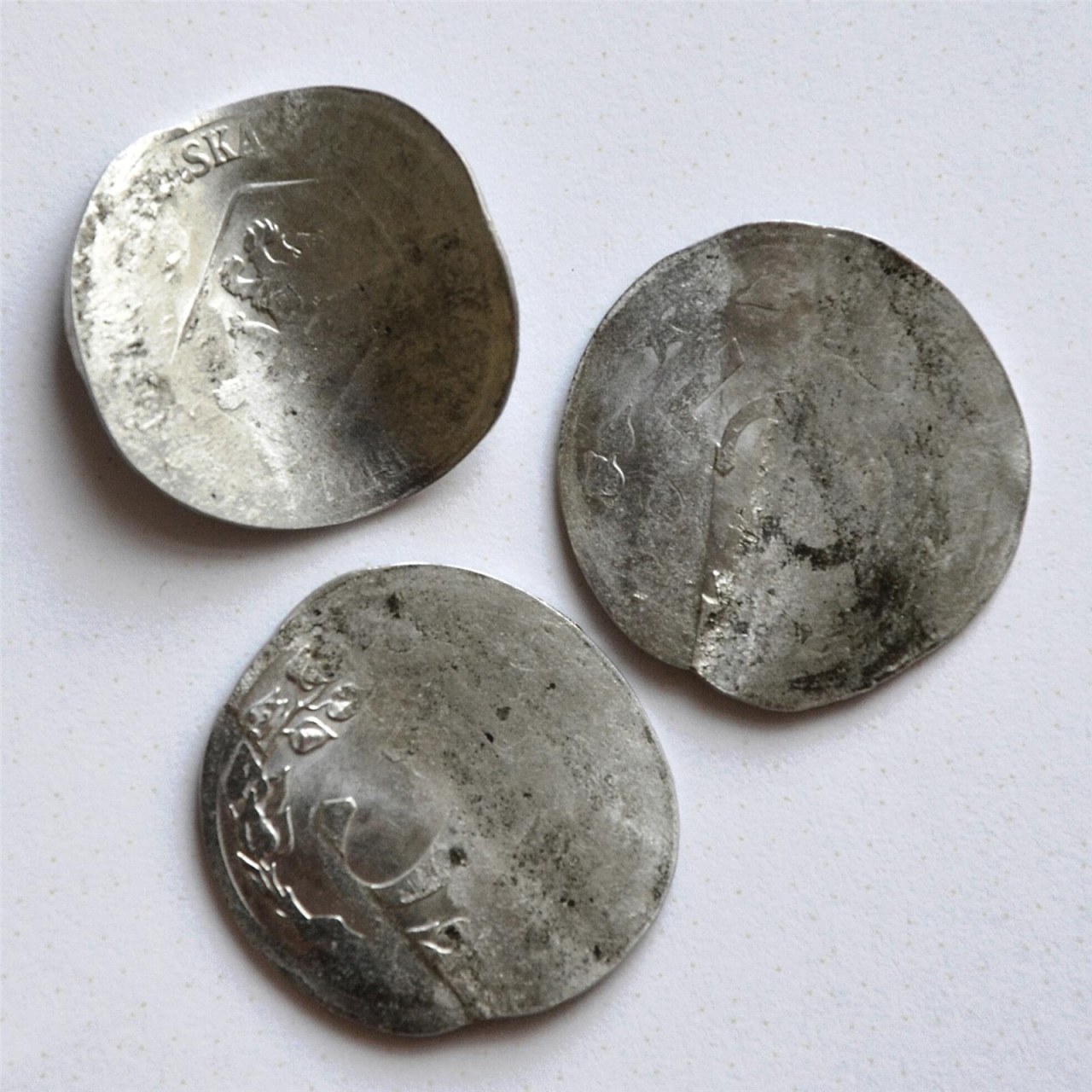 Three 5-haler coins